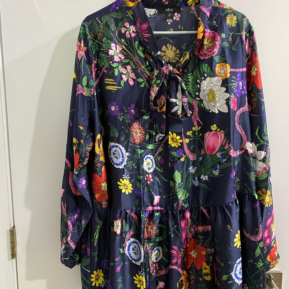 Tie neck peplum tunic